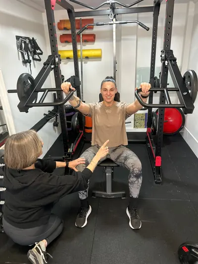 Liz Shaw personal trainer working with a client at The Everstrong Gym, Ealing